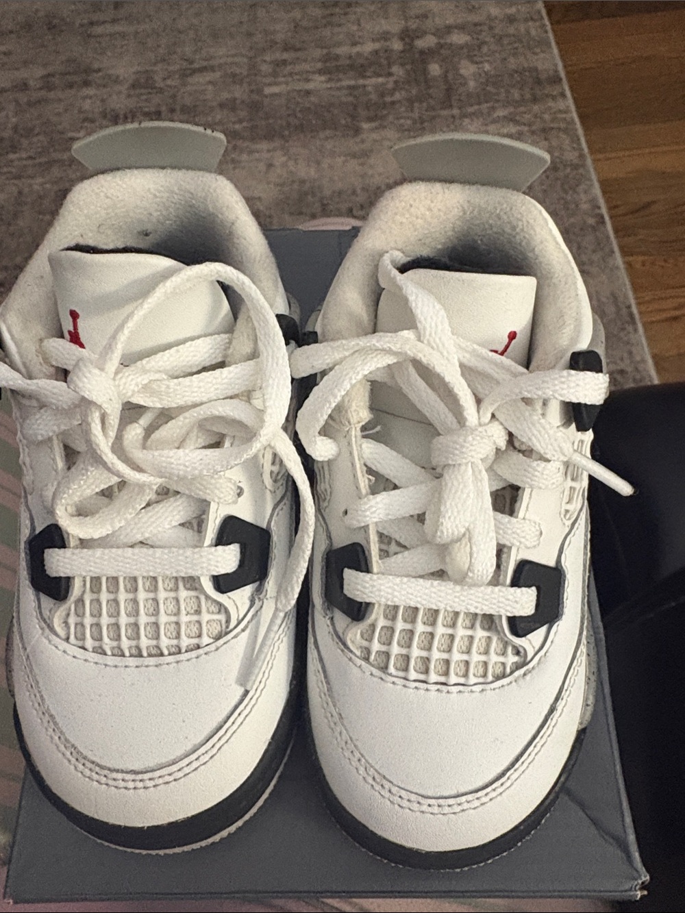 Kids White Jordan’s 4 Athletic Sneakers with Black Accents